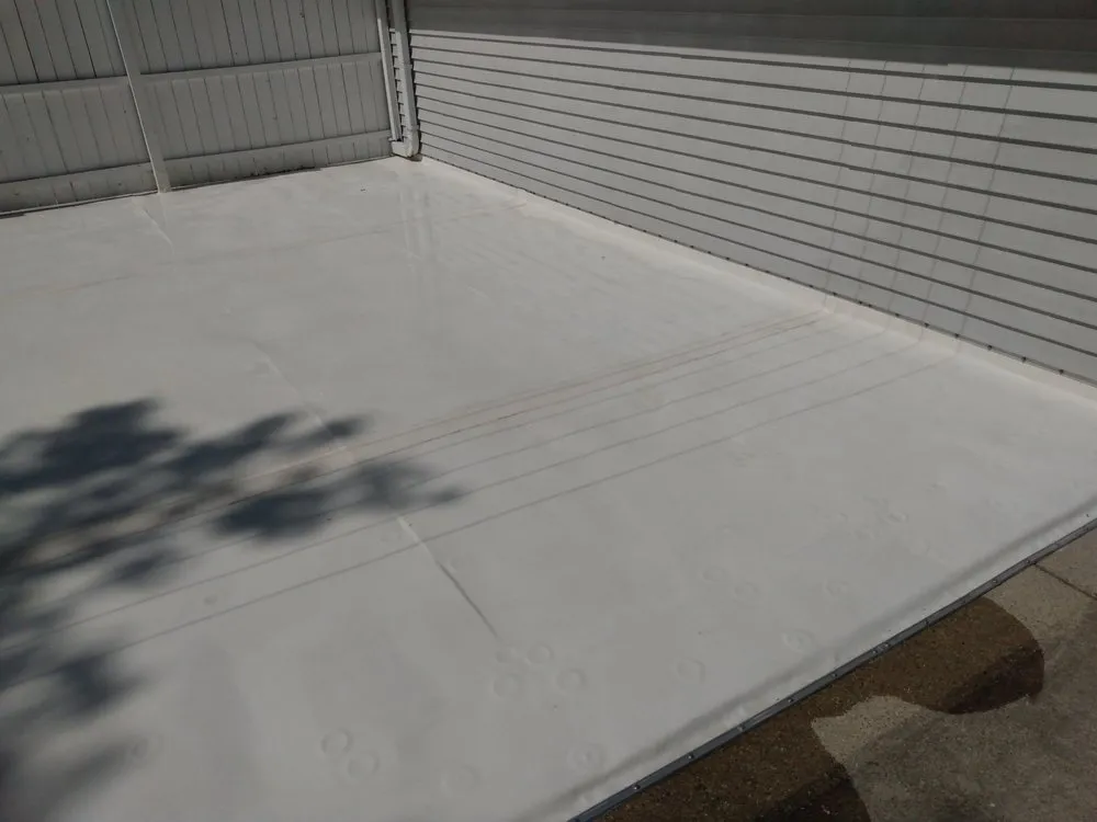 Slide of Tip Top Roofing & Gutters