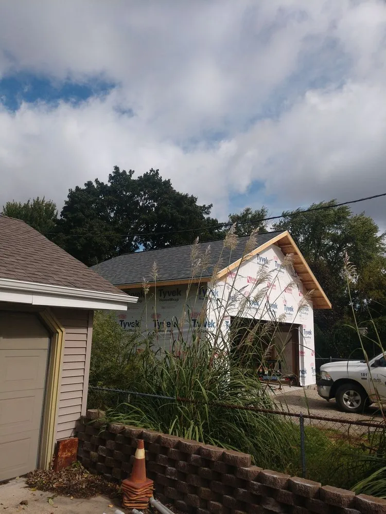 Slide of Tip Top Roofing & Gutters