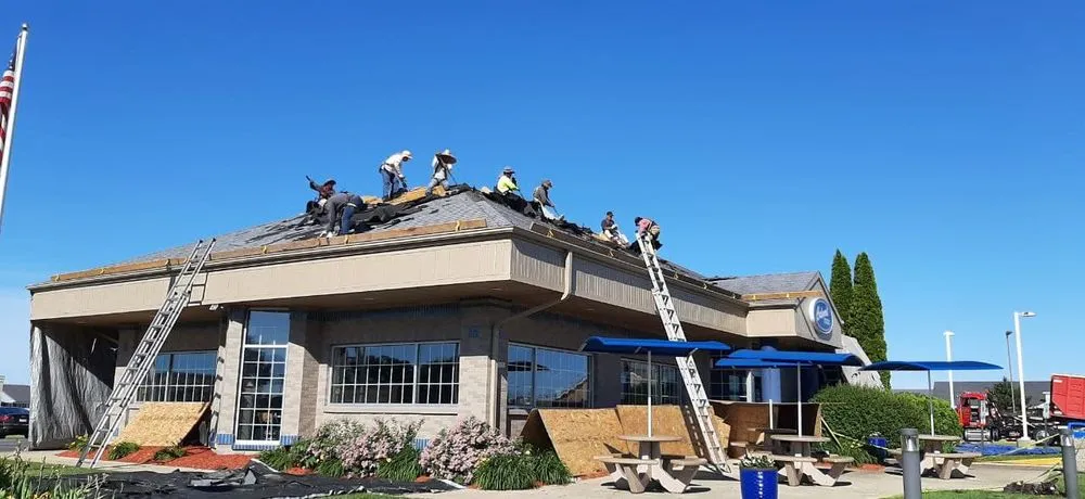 Slide of Tip Top Roofing & Gutters