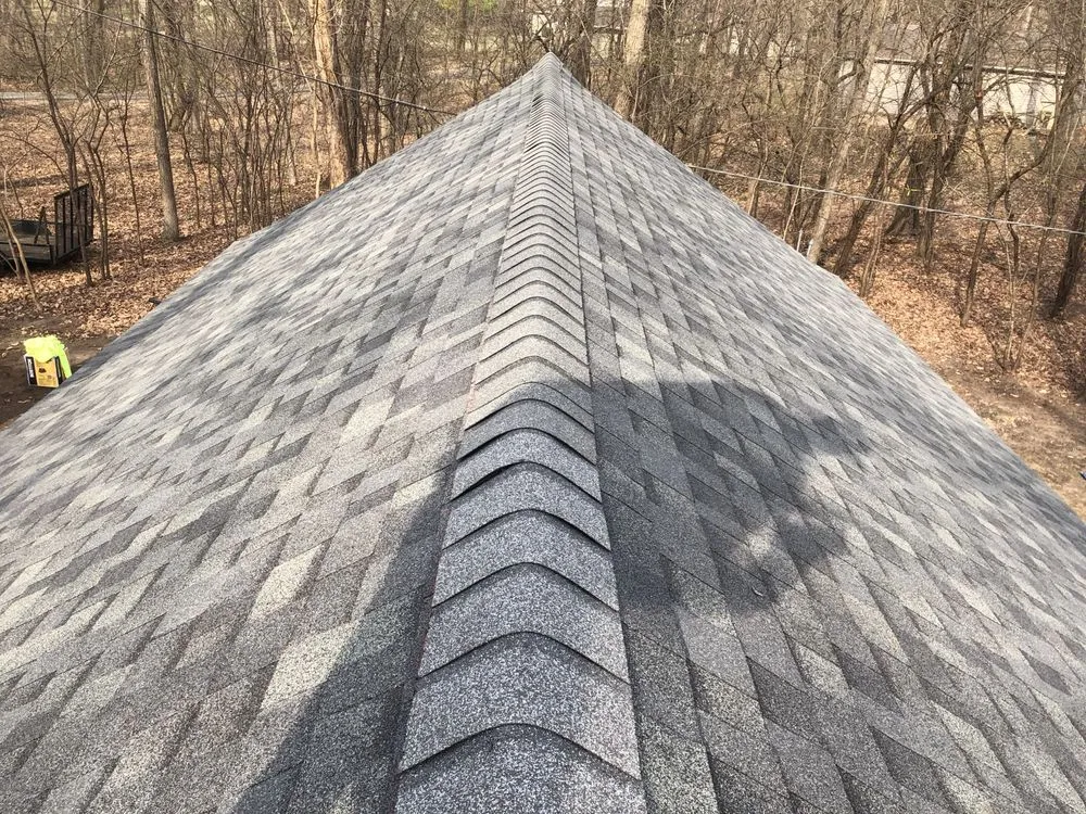 Slide of Tip Top Roofing & Gutters