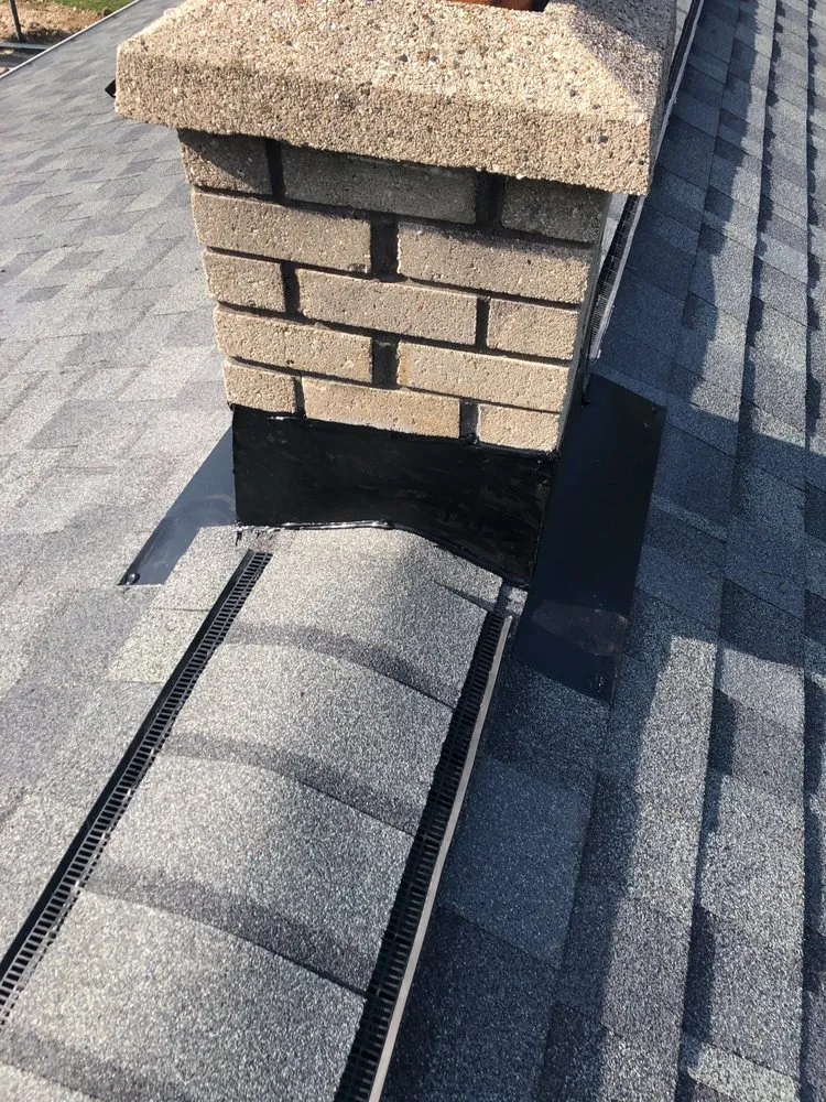 Slide of Tip Top Roofing & Gutters