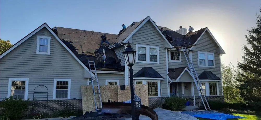 Slide of Tip Top Roofing & Gutters