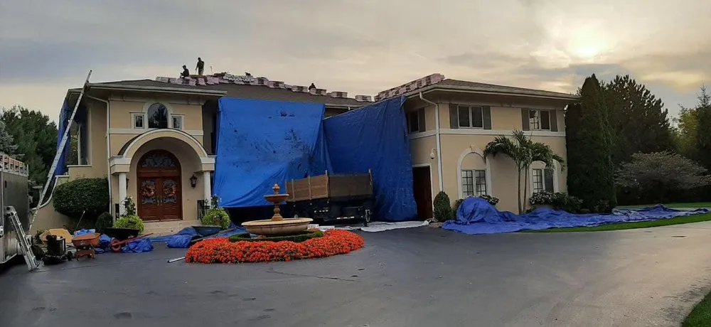 Slide of Tip Top Roofing & Gutters