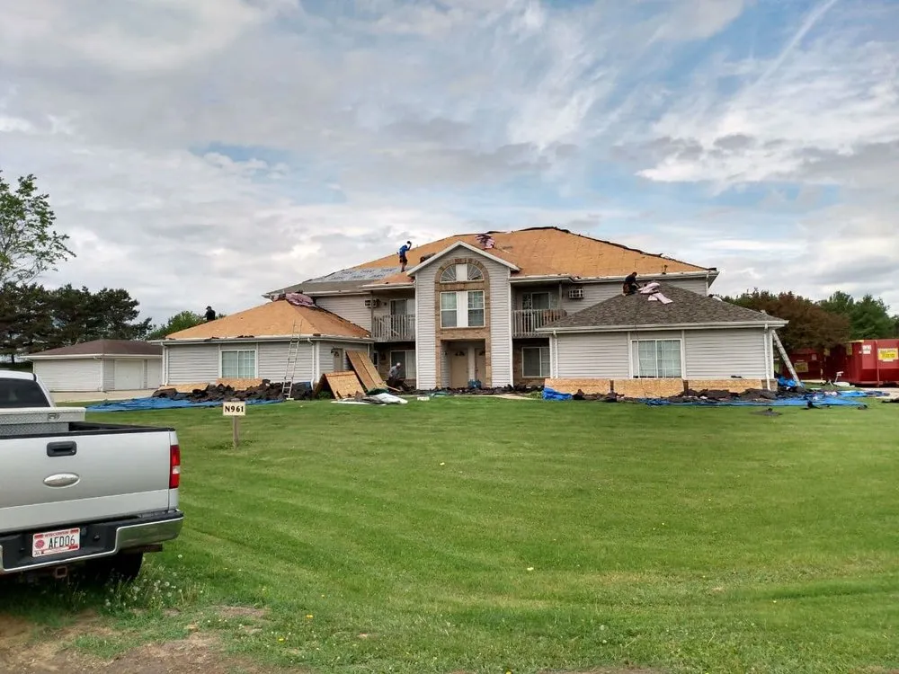 Slide of Tip Top Roofing & Gutters