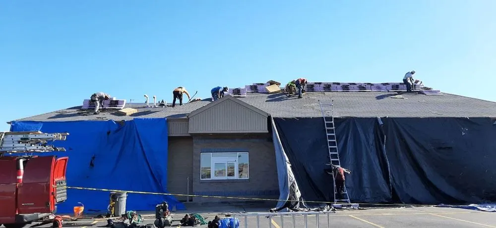 Slide of Tip Top Roofing & Gutters