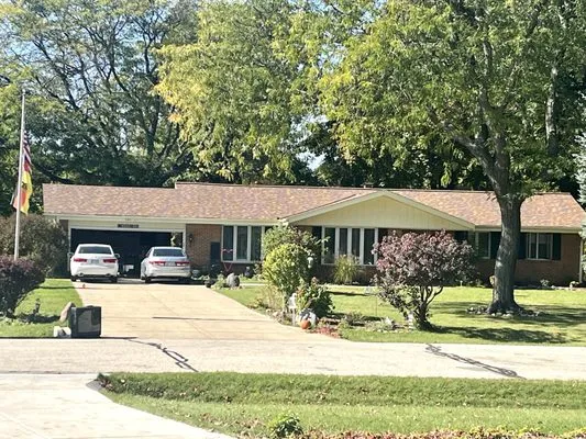 Tip Top Roofing & Gutters