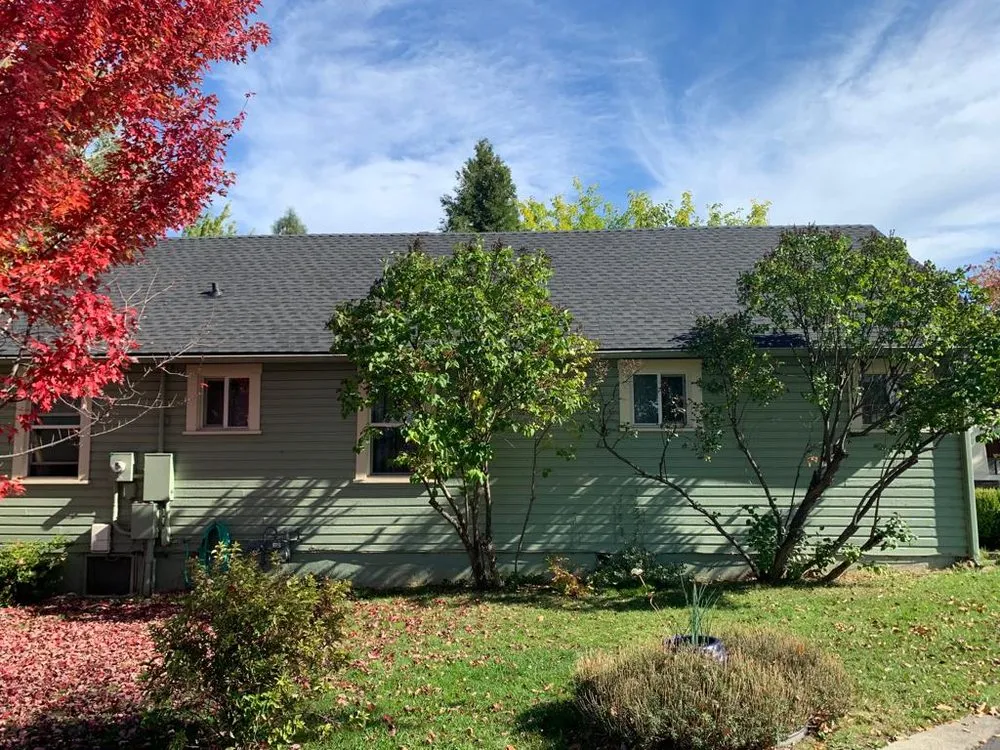 Slide of Tip Top Roofing 