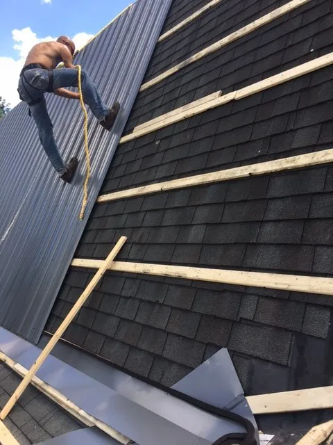 Slide of Tip Top Roofing & Siding