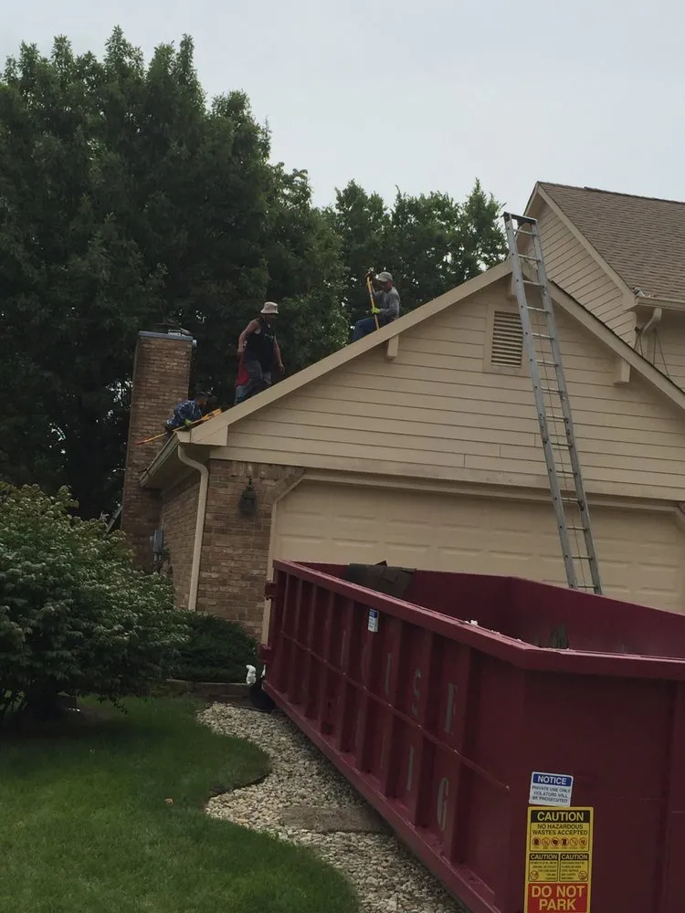 Slide of Tip Top Roofing and Construction