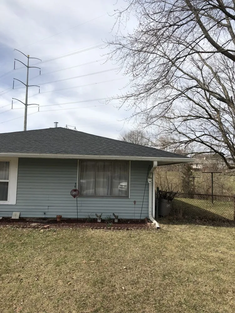 Slide of Tip Top Roofing and Construction