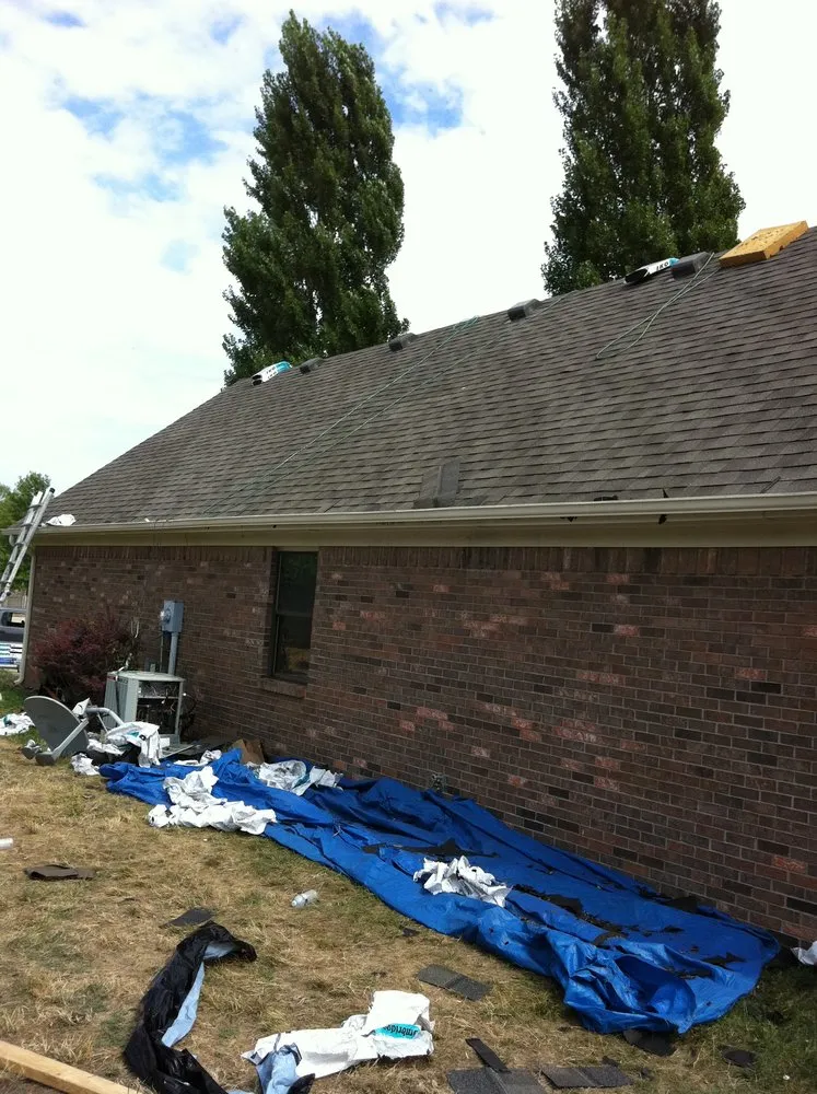 Slide of Tip Top Roofing and Construction