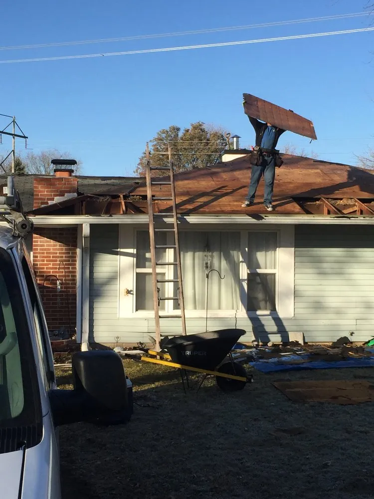 Slide of Tip Top Roofing and Construction