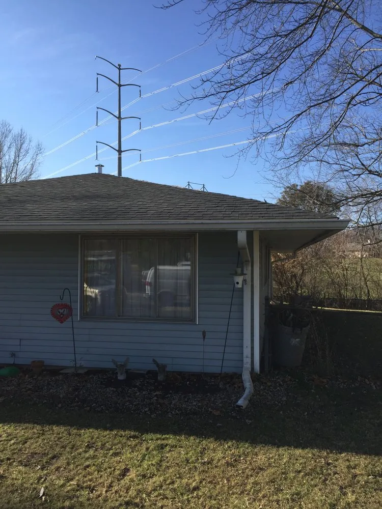 Slide of Tip Top Roofing and Construction