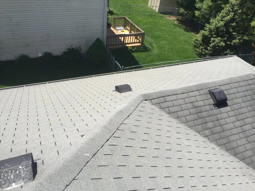 Slide of Tip Top Roofing and Construction