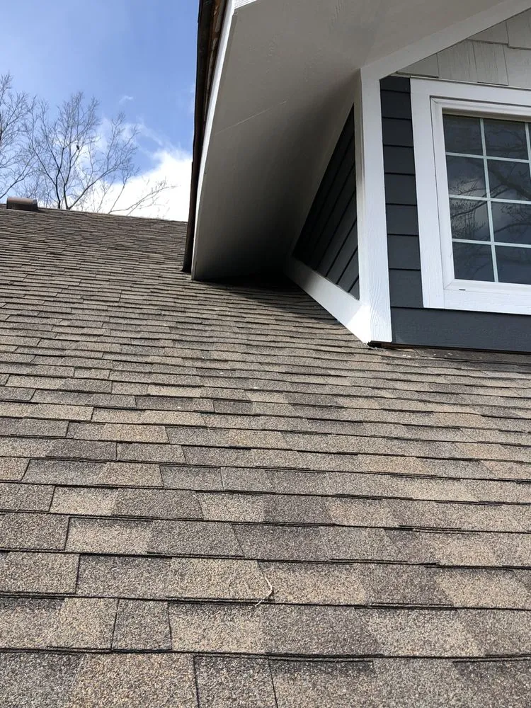 Slide of Tip Top Roofing and Construction