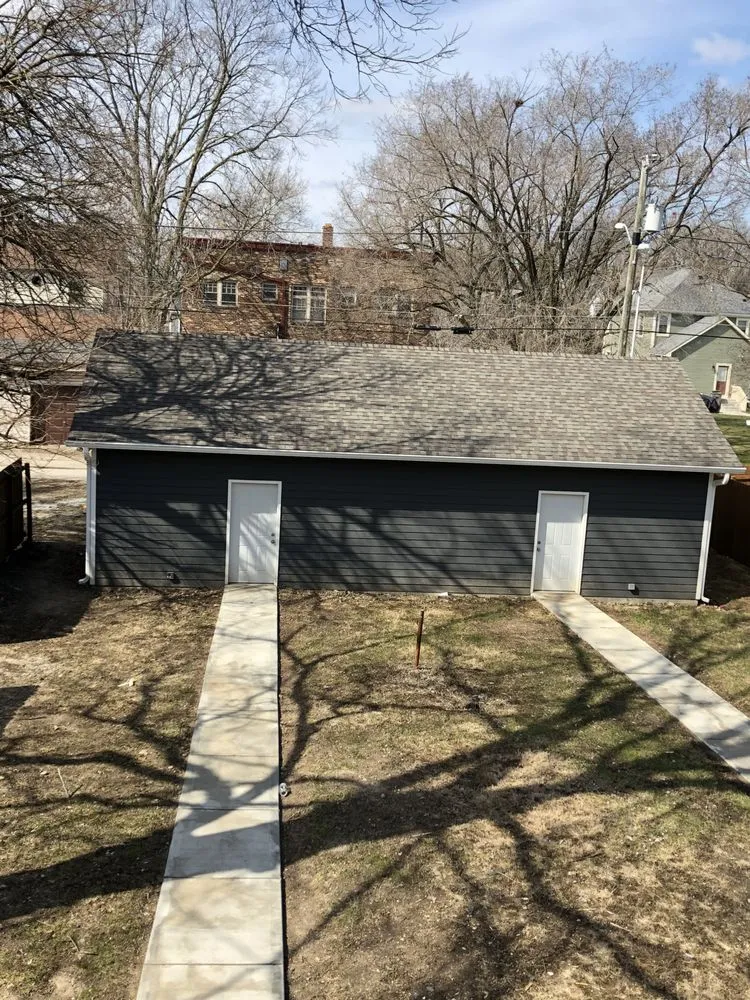 Slide of Tip Top Roofing and Construction