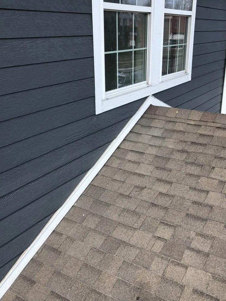 Slide of Tip Top Roofing and Construction