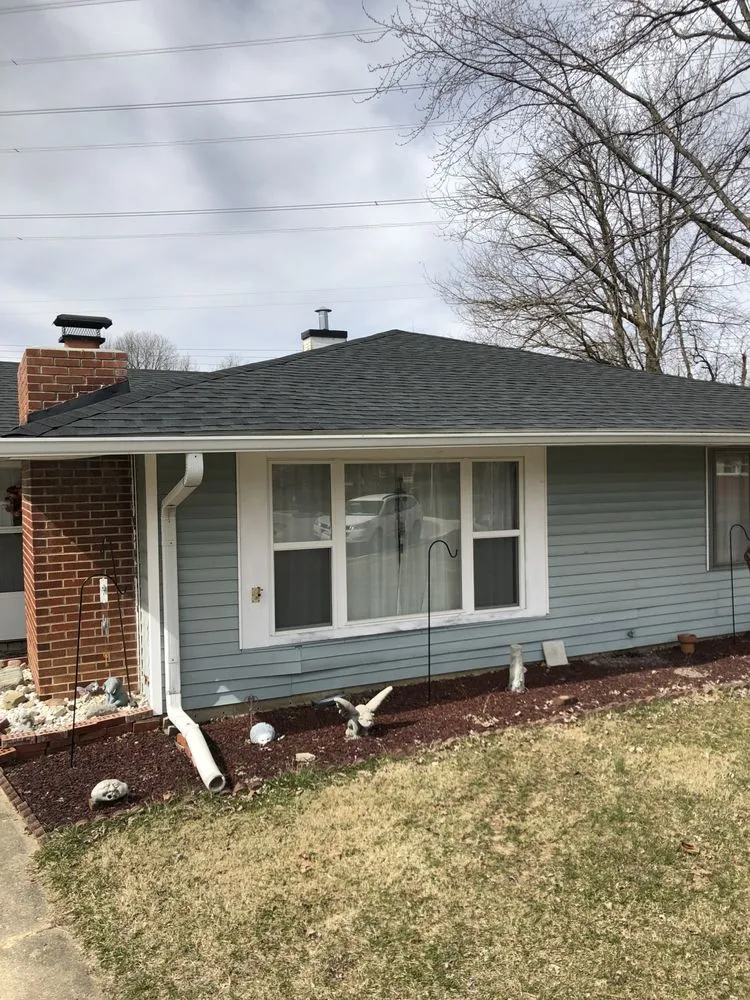 Slide of Tip Top Roofing and Construction