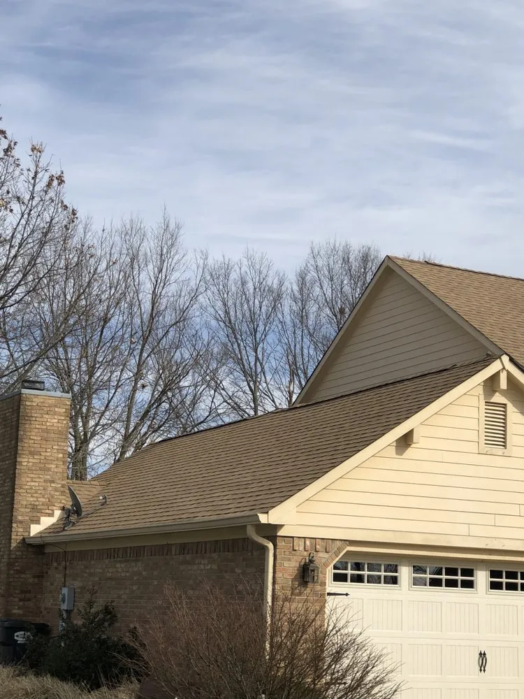 Slide of Tip Top Roofing and Construction