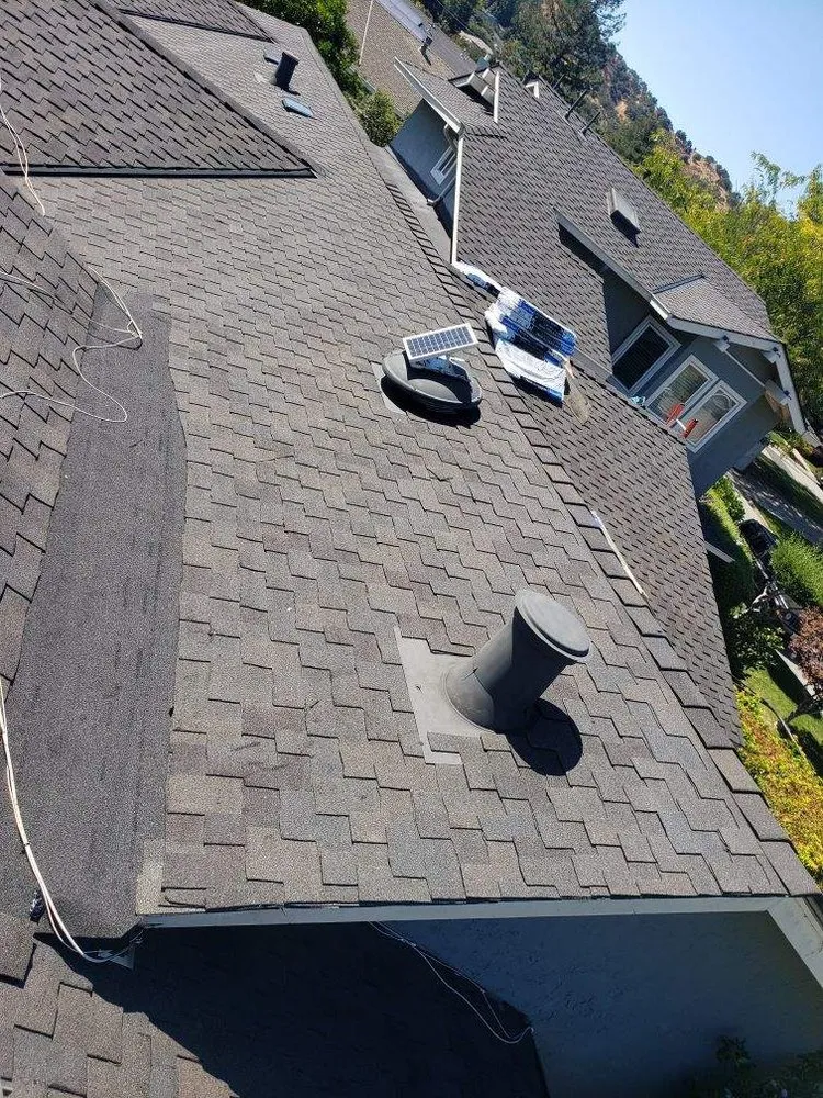 Slide of Tip Top Roofing