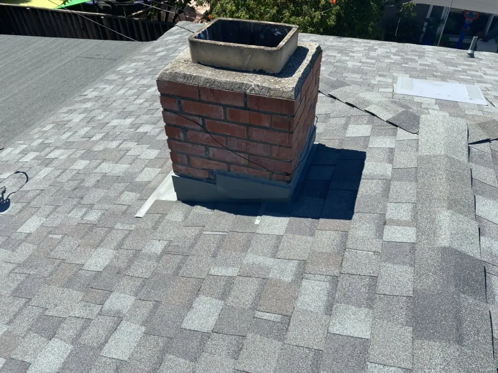 Slide of Tip Top Roofing
