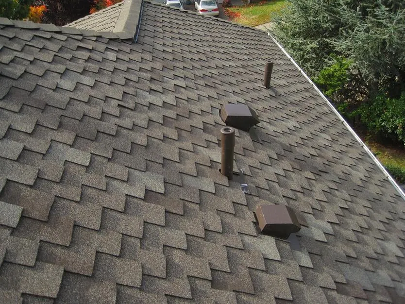 Slide of Tip Top Roofing