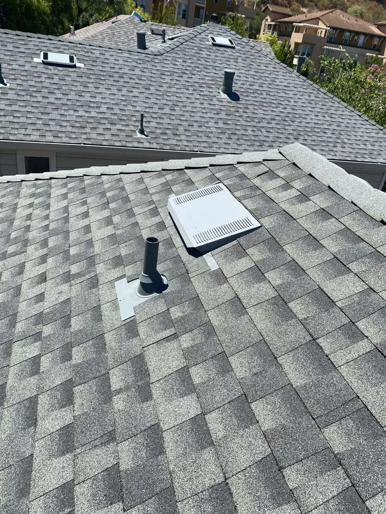 Slide of Tip Top Roofing