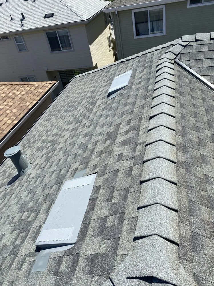 Slide of Tip Top Roofing
