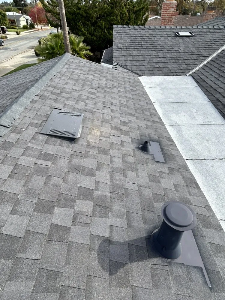 Slide of Tip Top Roofing