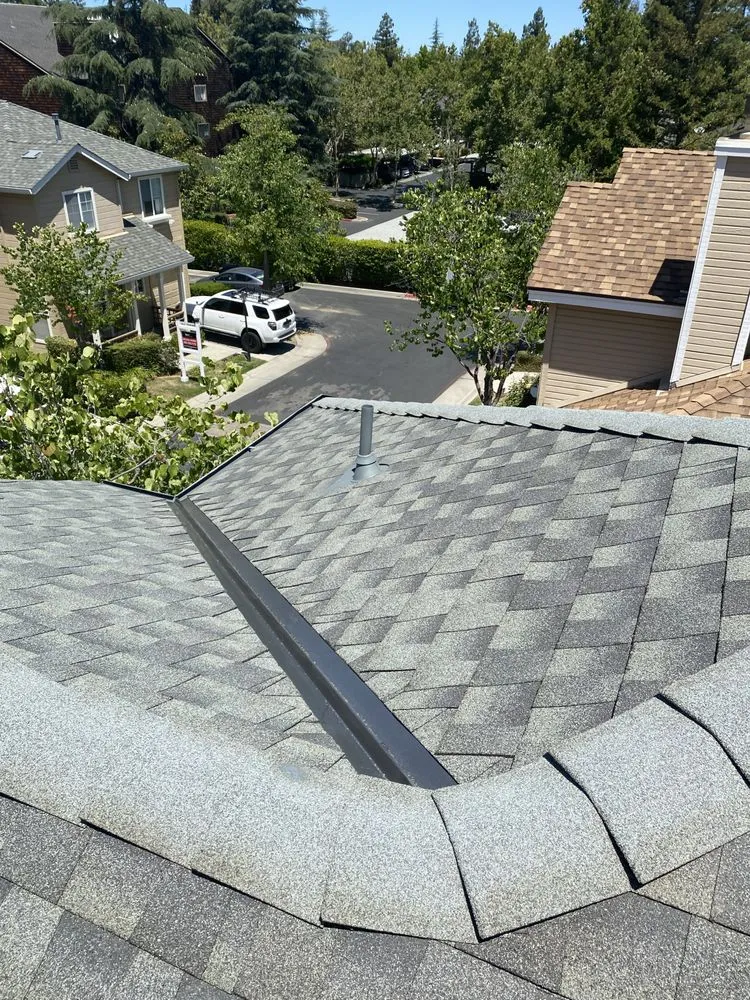 Slide of Tip Top Roofing