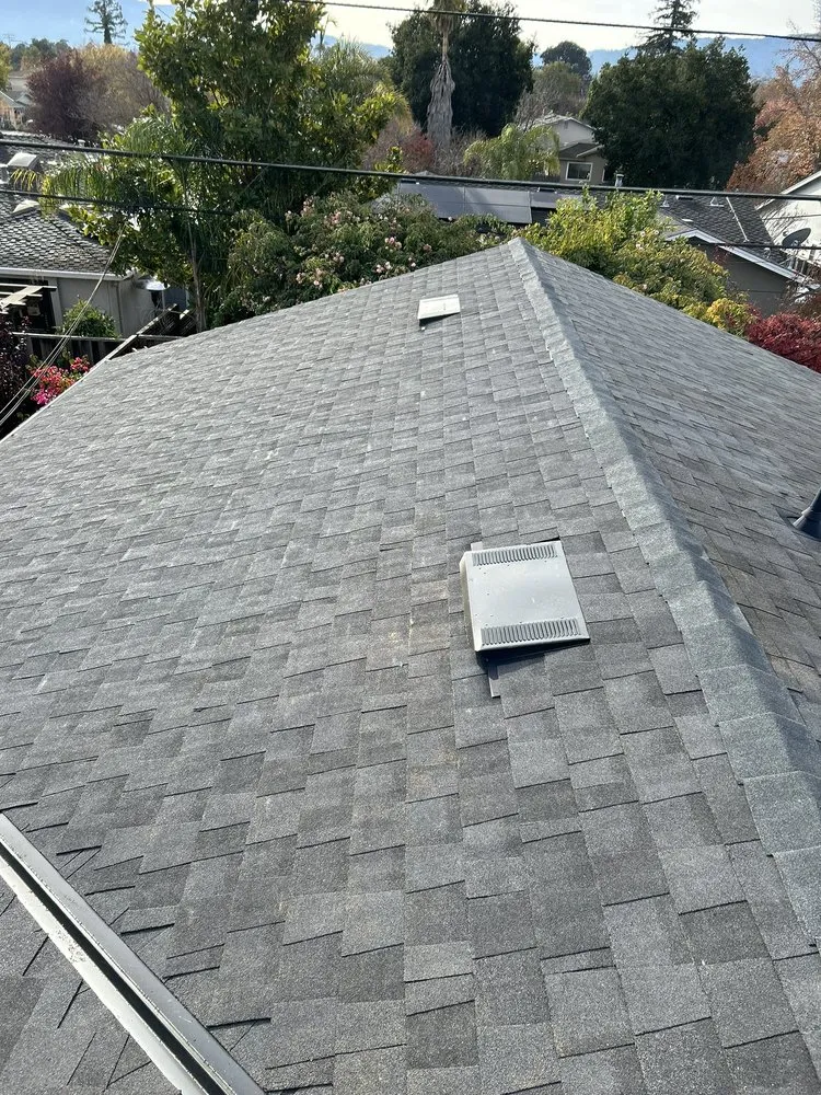 Slide of Tip Top Roofing