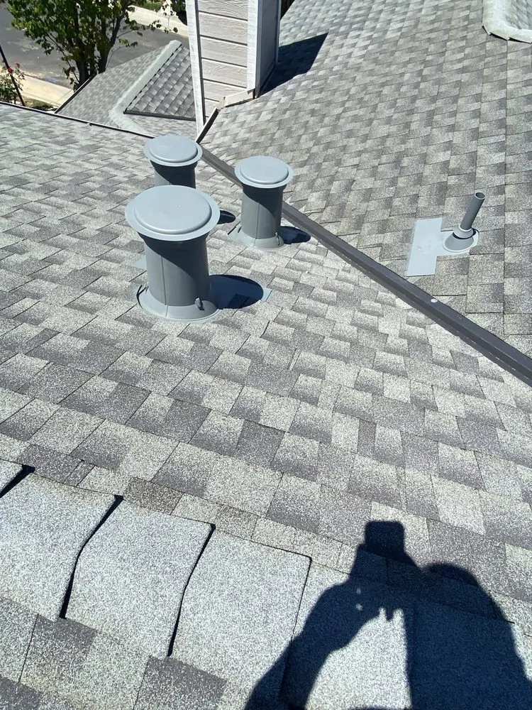 Slide of Tip Top Roofing