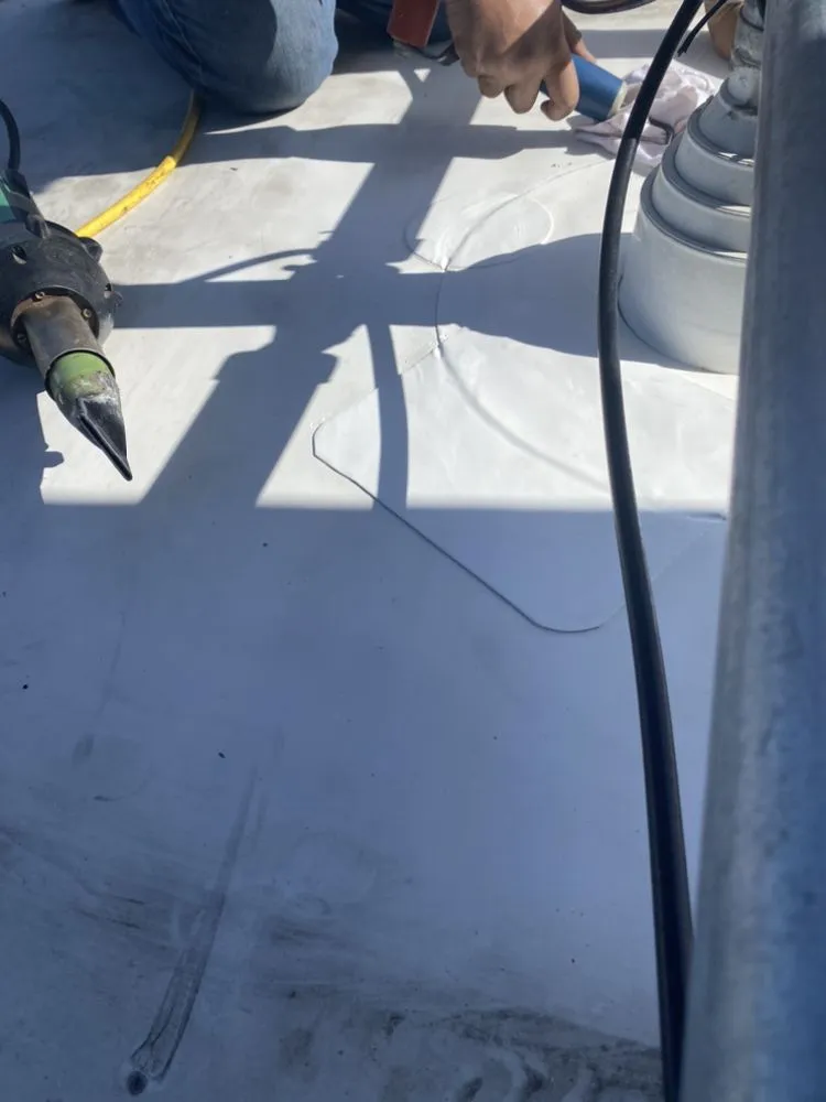 Slide of Tip Top Roofing