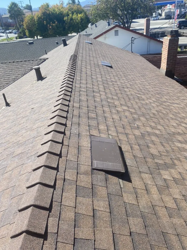 Slide of Tip Top Roofing