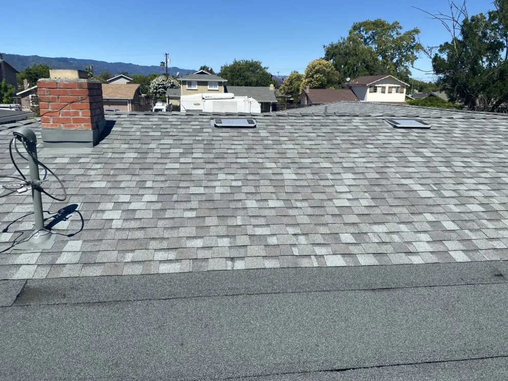 Slide of Tip Top Roofing