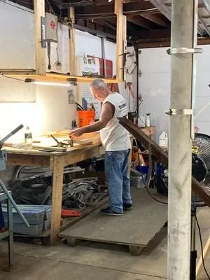 Slide of Tip Top Roofing Company