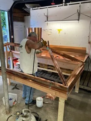 Slide of Tip Top Roofing Company