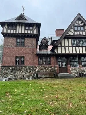 Slide of Tip Top Roofing Company