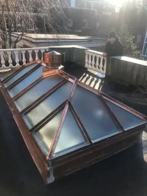 Slide of Tip Top Roofing Company