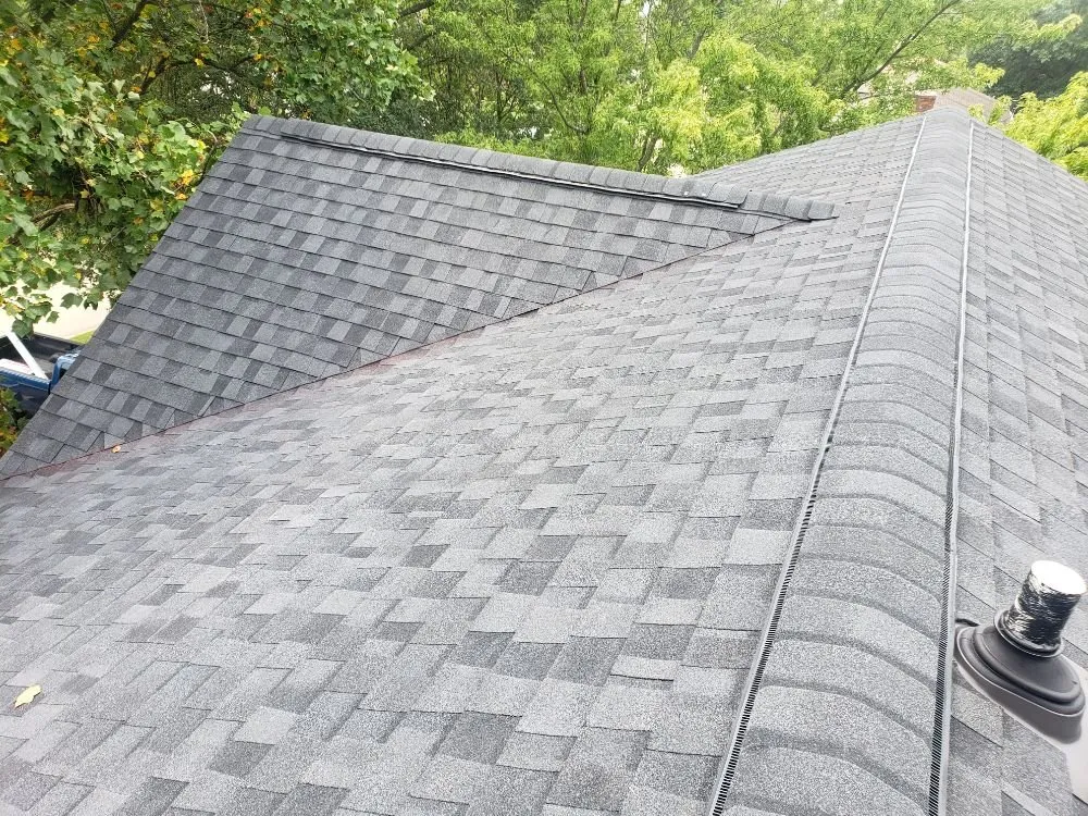 Slide of Tip-Top Roofing