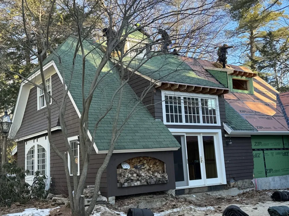 Slide of Tip Top Roofing