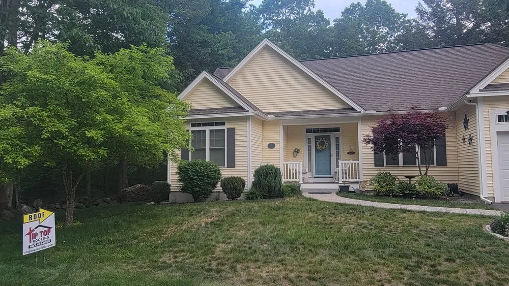 Slide of Tip Top Roofing