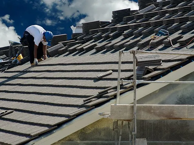 Slide of Tip Top Roofing