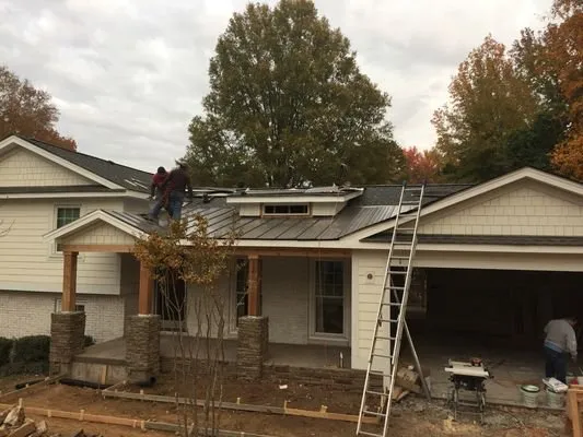 Slide of Tip Top Roofing