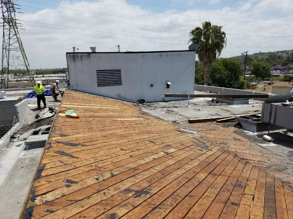 Slide of Tip Top Roofing