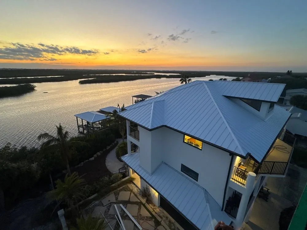 Slide of Tip Top Roofing