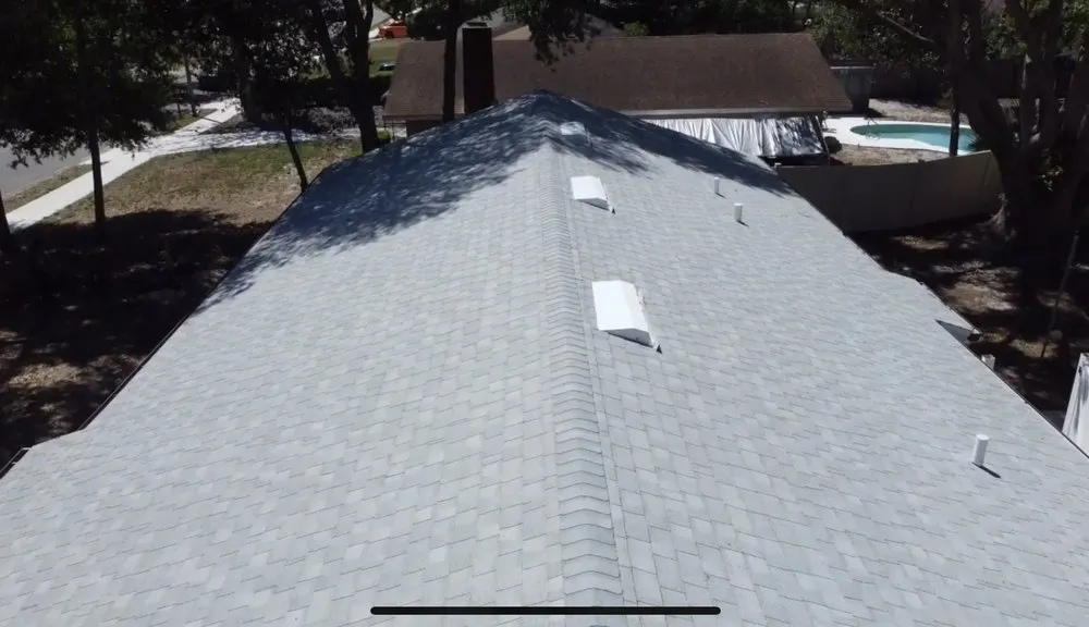 Slide of Tip Top Roofing