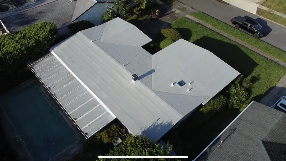 Slide of Tip Top Roofing