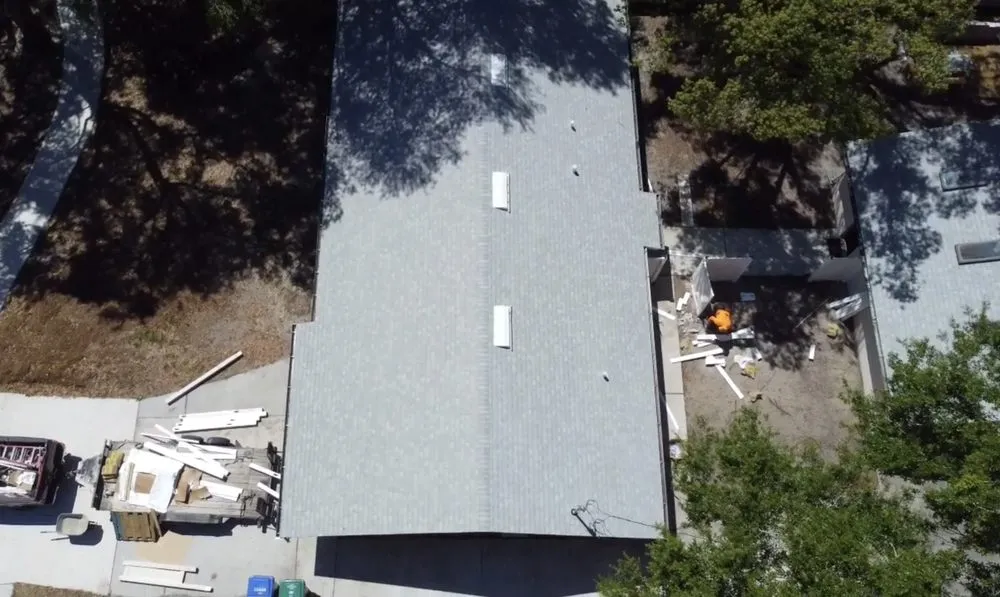 Slide of Tip Top Roofing