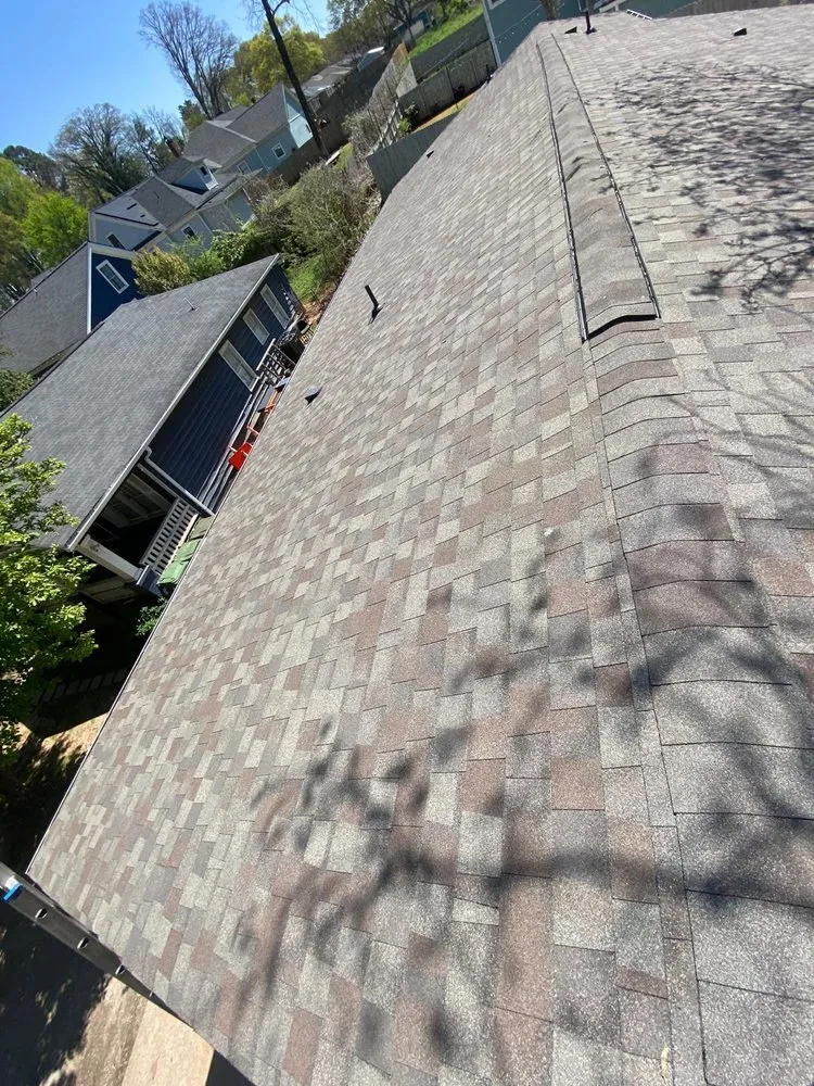 Slide of Tip Top Roofing Service
